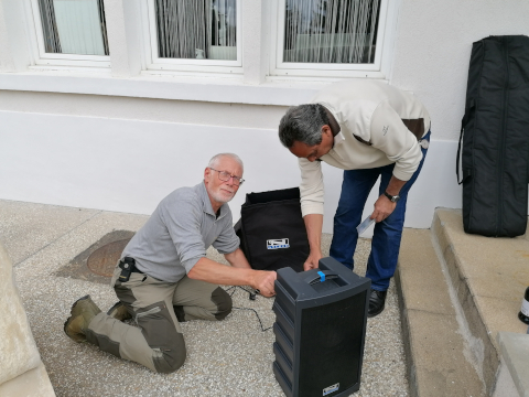 Our vice president (Bruno) and Roland, working on the sound system for the wreath laying