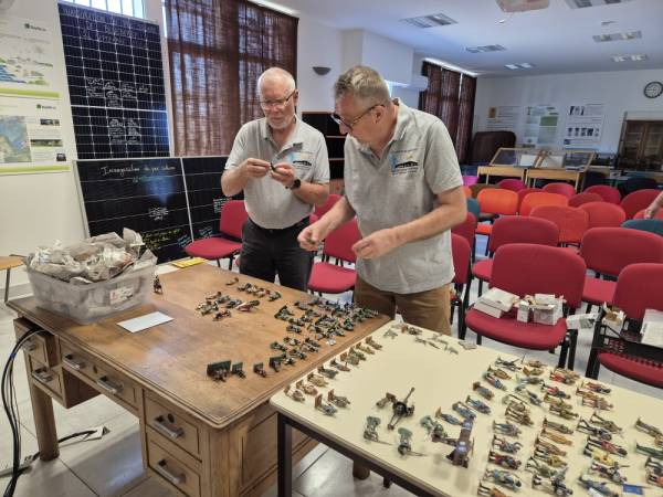 Bruno and Frédéric making inventory of a very small part of the museum donated by Michel and Mauricette Petit